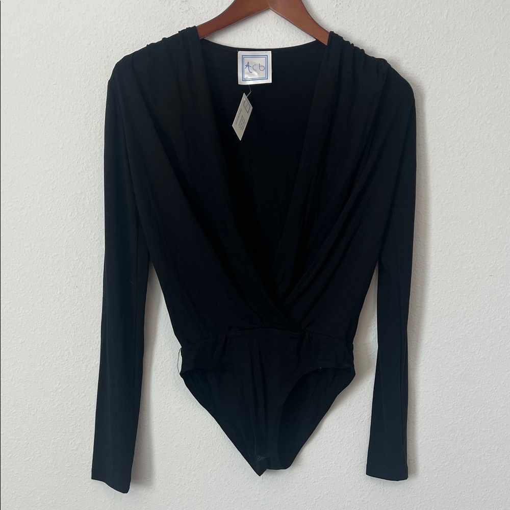 NWT BOUTIQUE Black Long Sleeve Bodysuit